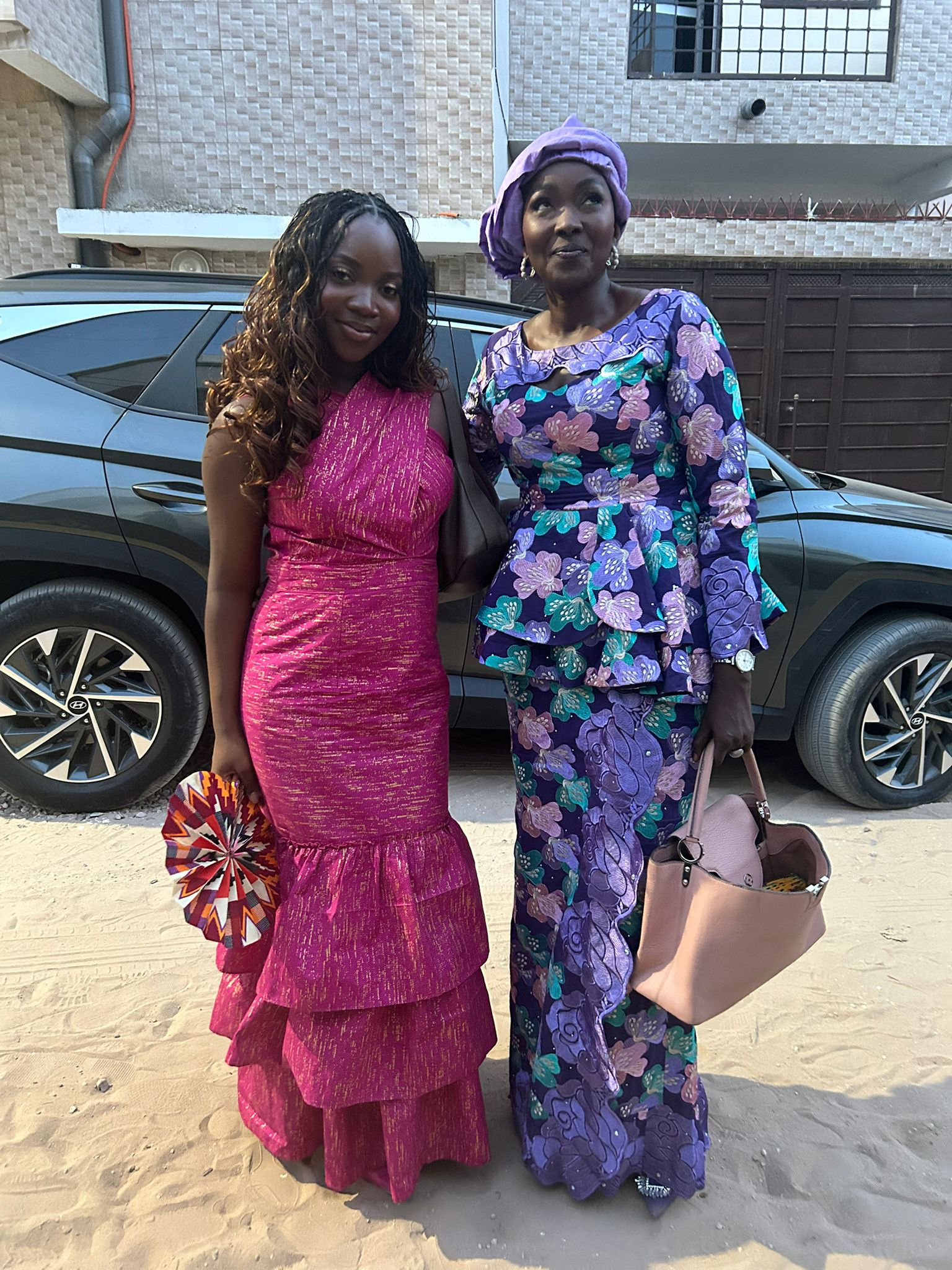Student with her host mother in traditional garb going for a wedding.